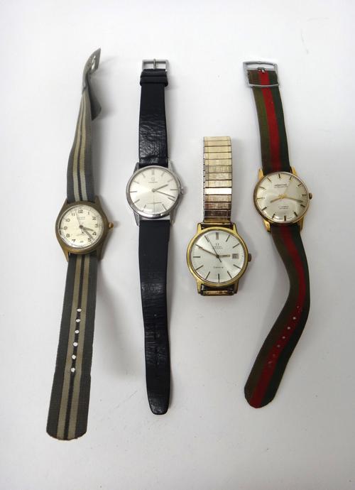 An Omega Automatic gilt metal fronted and steel backed gentleman's wristwatch, the signed silvered dial with baton numerals, date of the month apertur