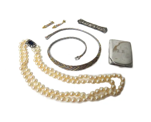 A two row necklace of uniform cultured pearls, comprising of 54 and 58 beads, on a silver, blue and colourless paste set clasp, a silver and gilt coll