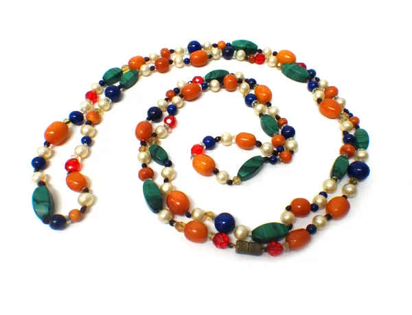 A single row necklace of composite beads, including amber, malachite, lapis lazuli and imitation pearls, a quantity of loose amber beads, weight 24 gm