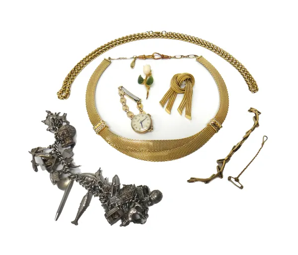 A group of jewellery, comprising; a curb link charm bracelet, fitted with a variety of mostly silver charms, a Tissot lady's bracelet wristwatch, a 9c