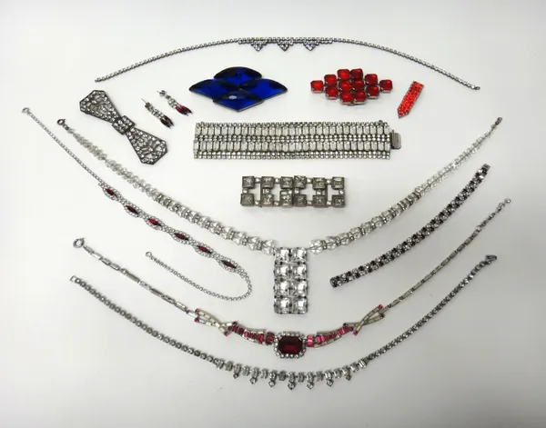 A colourless paste set wide bracelet, a red and colourless paste necklace with a pair of similar earrings, a red and colourless paste bracelet and a r