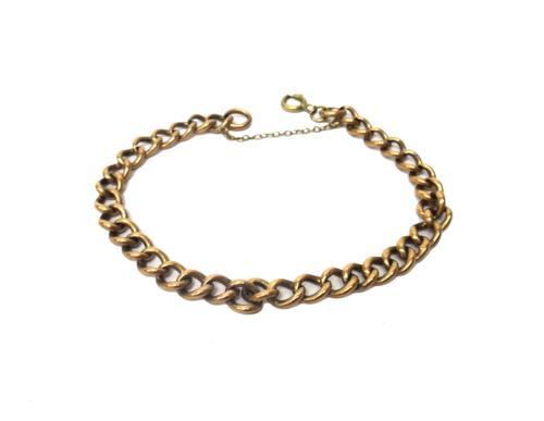 A gold hollow curb link bracelet, detailed 9C on a bolt ring clasp, weight 7.8gms.