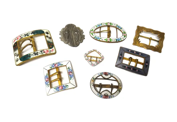 A group of six gilt metal and enamelled buckles with floral decoration, two piece buckle decorated with eastern figures and a gilt metal shaped rectan