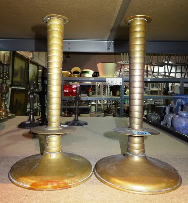 A pair of Victorian brass candlesticks, with ribbed columns and circular drip trays, 32cm tall (2).  S3T