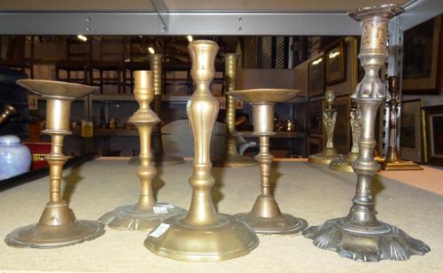A group of five 18th century and later bronze candlesticks including a pair with petal bases and wide sconces, tallest 23cm (5)  S3T