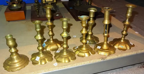A group of eight 18th century and later brass candlesticks, tallest 21cm tall (8).  S3B