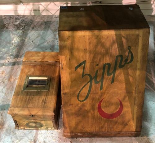 An early 20th century pine shopkeepers zips display box, with eight integral shelves, 39cm wide x 50cm high and an early 20th century mahogany pull dr