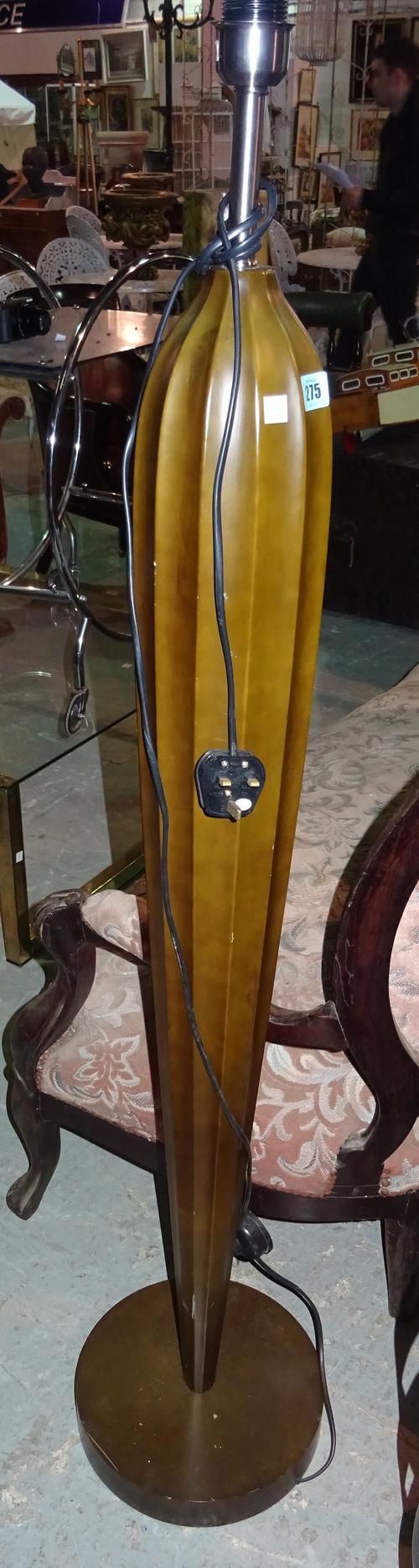 A 20th century faux bronze standard lamp of tapering form and plinth base, 145cm high, (a.f).  J7