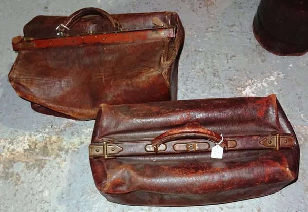 An early 20th century small brown leather Gladstone type bag and another similar, approx 48cm x 25cm, (2).  H2