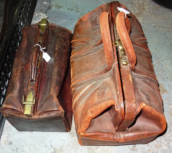 An early 20th century small brown leather Gladstone type bag and another, the largest 50cm x 28cm, (2).  H2