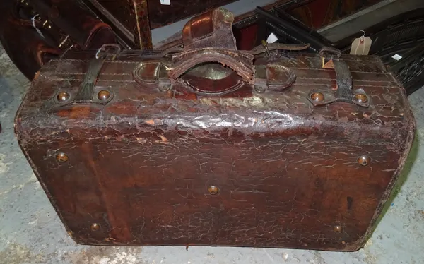 An early 20th century brown leather suitcase, 56cm x 33cm.  H2
