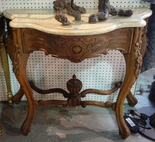 An 18th century style console table, with faux marble top on serpentine carved hardwood base, 100cm wide x 84cm high x 50cm deep.  A6