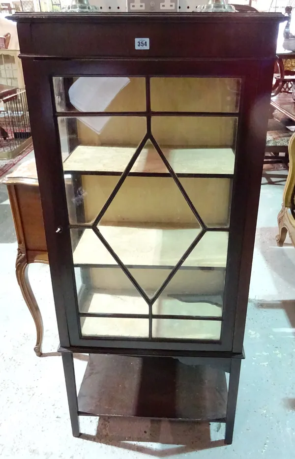 A 20th mahogany display cabinet, on square tapering supports, 61cm wide x 136cm high.  J5