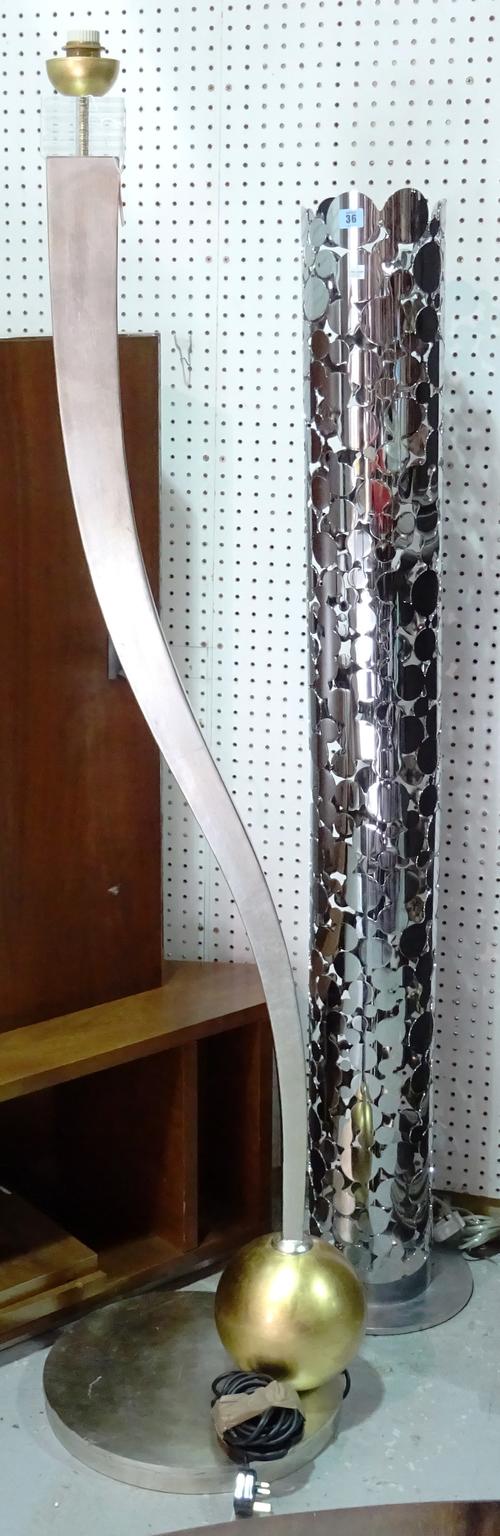 A modern chromed  floor lamp of cylindrical pierced form, 155cm high, and a modern Italian silvered metal standard lamp of shaped form, on a gilt circ
