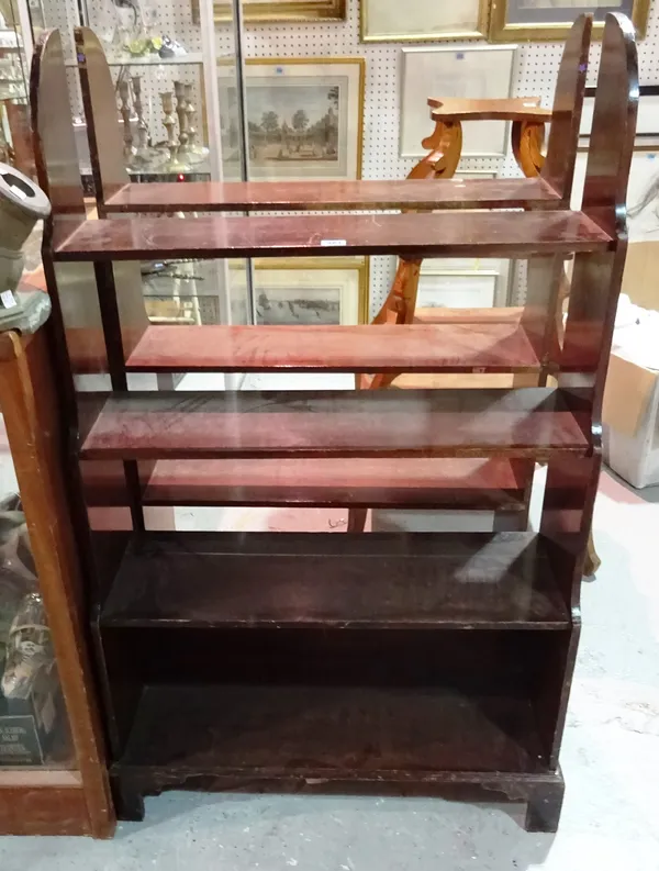 A pair of mahogany floor standing open four tier waterfall bookcases, each 77cm wide x 121cm high, (2).  C3