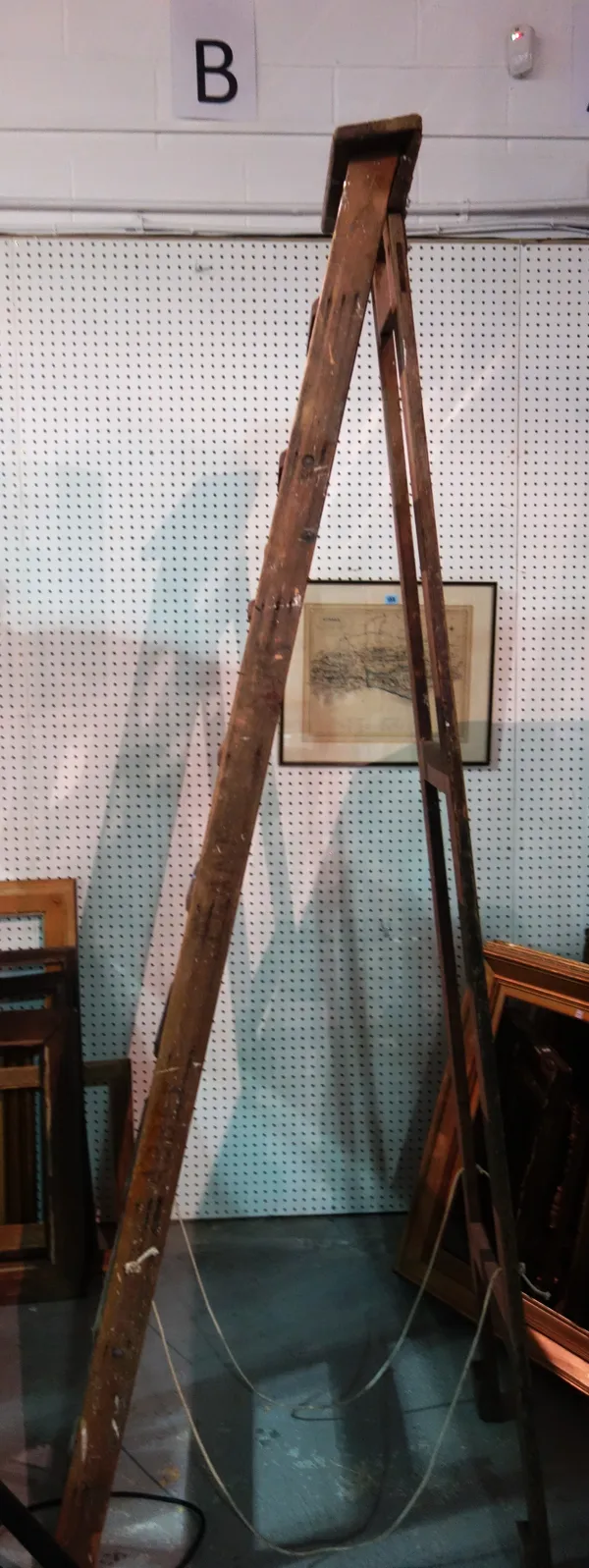 An early 20th century pine ten rung folding 'A' frame ladder.  CAB