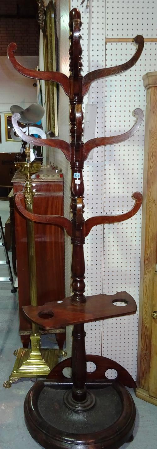 A 19th century mahogany coat and umbrella stand, with semi-elliptic base, (a.f).  G10