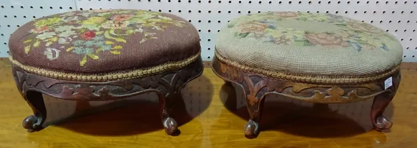 A pair of Victorian walnut oval upholstered footstool, 35cm wide x 19cm high.  E10