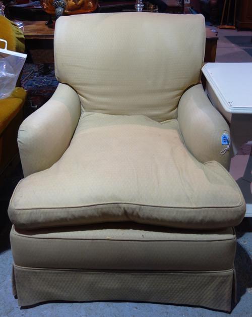 A 20th century mahogany framed Howard style easy armchair.  I4