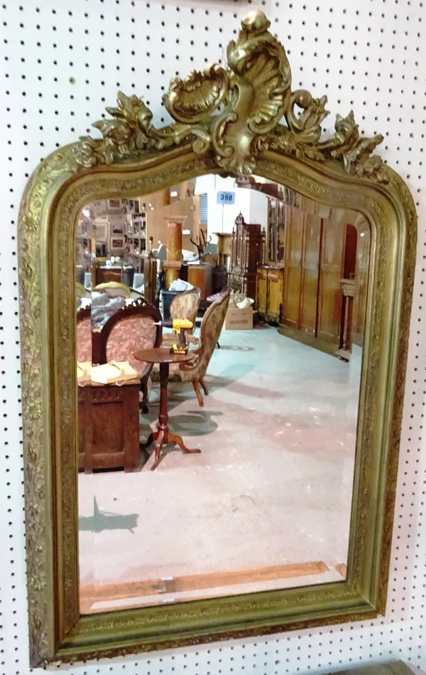 An early 20th century gilt framed rectangular wall mirror with acanthus crest, 75cm wide x 105cm high.  K10