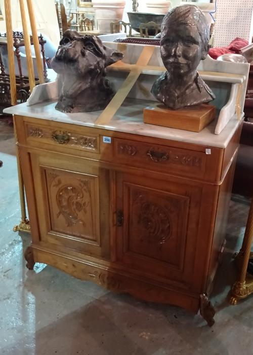 A 20th century Continental beech side cabinet with two drawers over cupboard base and white marble top, 86cm wide x 90cm high.   F5