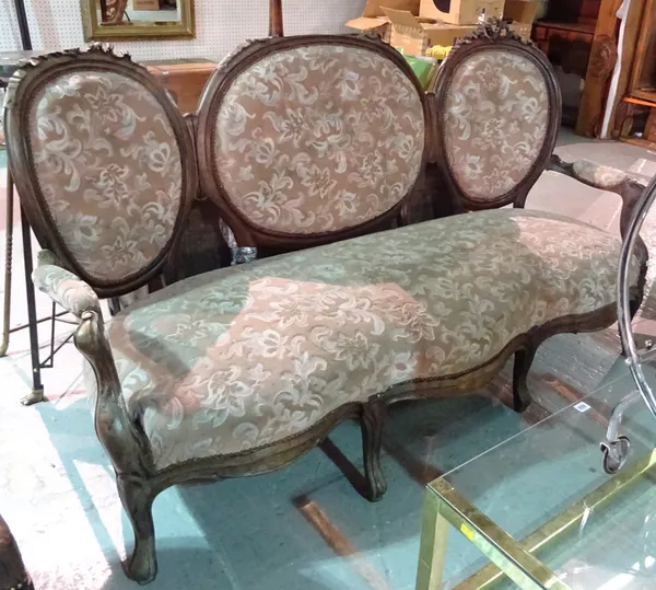 A Victorian rosewood serpentine triple spoon back sofa, on cabriole supports, 185cm wide, (a.f).  J9