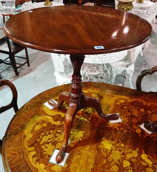 A George III style mahogany tripod table, on turned column and pad feet, 68cm wide x 71cm high, together with another similar, 62cm wide x 71cm high,