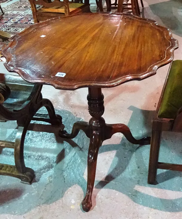 A George II mahogany tripod table, with pie-crust edging, on claw feet, 68cm wide x 72cm high.  B5