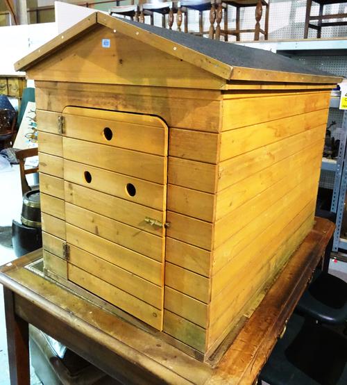 A 20th century large stained pine outdoor dog kennel, with felt top, 82cm wide x 95cm high.  K3