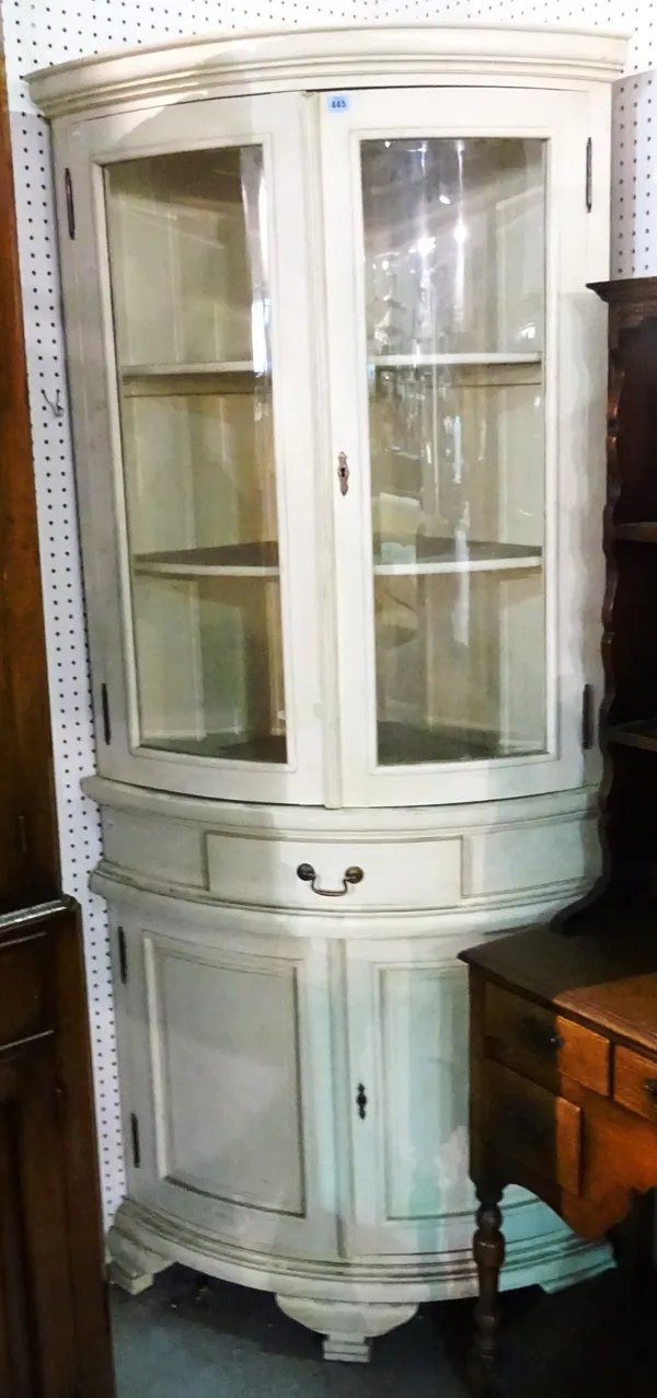 A 20th century white painted bowfront corner display cabinet cupboard, of mid-18th century style, 90cm wide x 201cm high.  M10