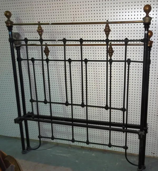 A late Victorian black painted and brass double bed, 138cm wide x 205cm long.  J10