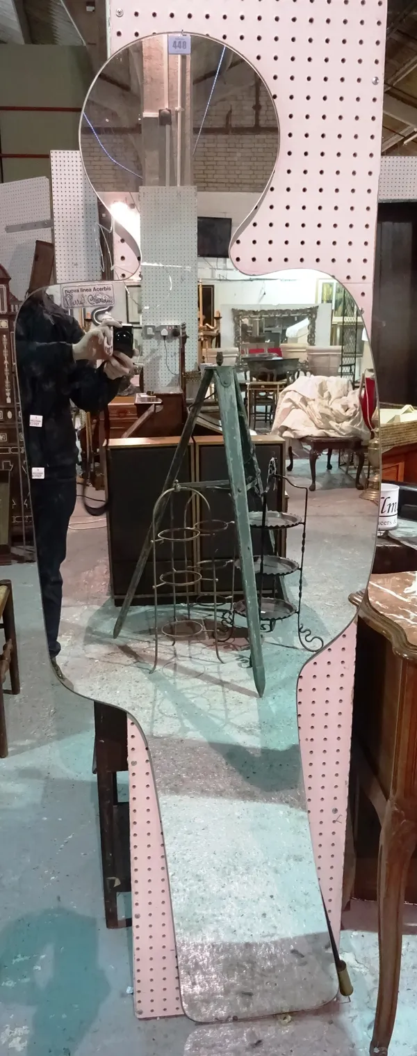 A figural Pierre Cardin mirror, 48cm wide x 176cm high.  J5