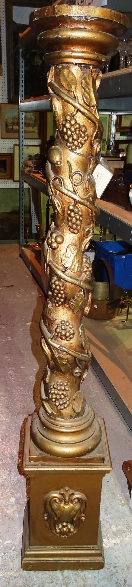 A 20th century gold painted jardiniere stand, on spiral central column and plinth base decorated with grapes and vines, 25cm wide x 120cm high.  J2