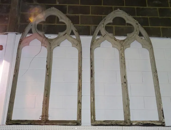 A pair of 20th century fibreglass Gothic style grey painted window frames, each 114cm wide x 228cm high, (2).  K10