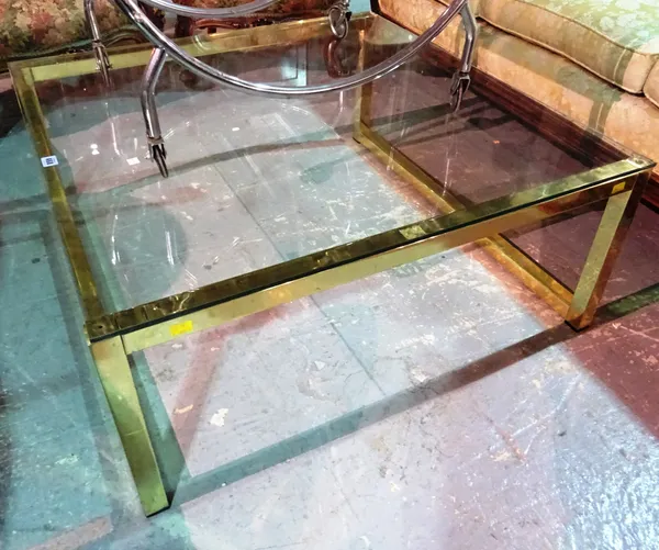 A 20th century brass and glass rectangular coffee table, 90cm wide x 39cm high.  J7