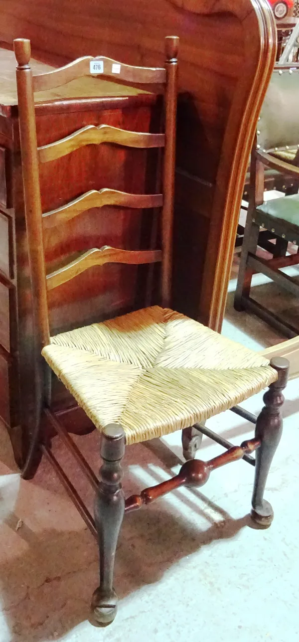 A late 18th century ash and elm ladder back dining chair, on tapering pad supports, together with a 19th century oak ladder back dining chair, (2).  J