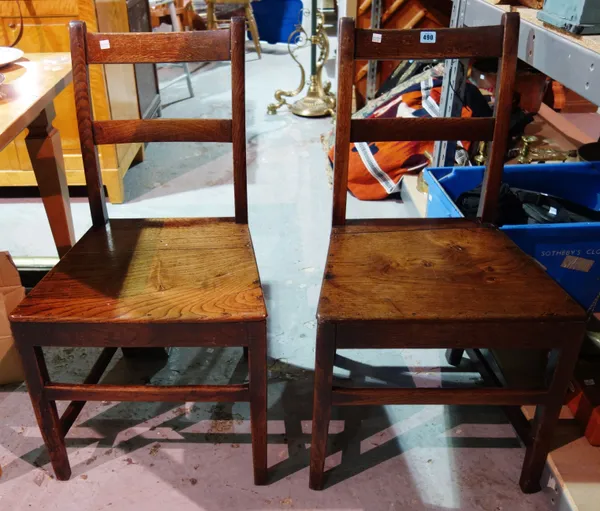 A set of four 19th century oak bar back dining chairs, (4).  H1
