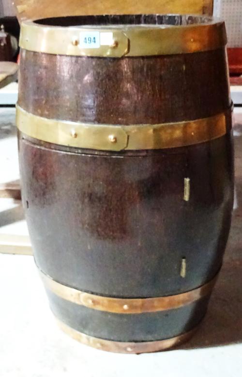 A 20th century oak cupboard formed out of a coopered barrel, 41cm wide x 67cm high.  K3