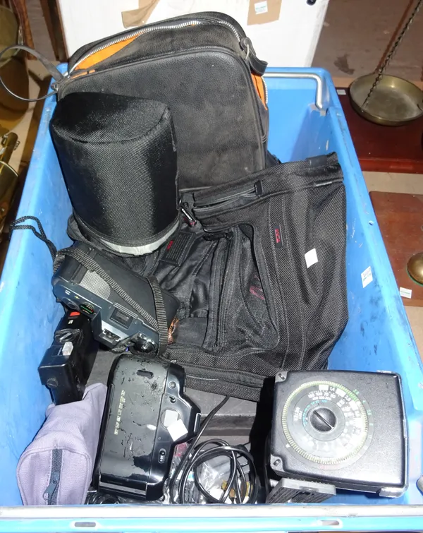 A quantity of vintage cameras and related accessories, including; Nikon F90, Canon, Olympus, travel bags and sundry, (qty).  S3B