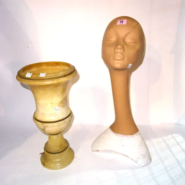 A 20th century alabaster urn shaped table lamp 43cm high and a 20th century stylized mannequin head, 60cm high, (2). S2B