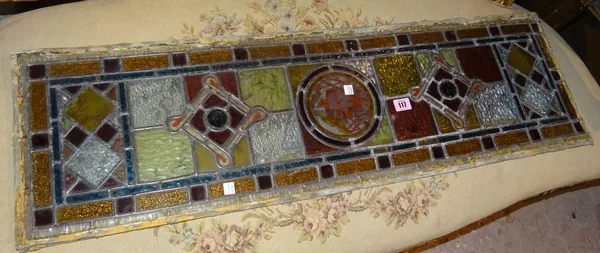 A pair of early 20th century rectangular leaded stained glass panels 100cm x 32cm (2).  OUT