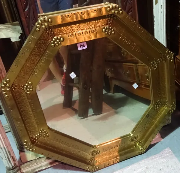 A 20th century gilt metal octagonal wall mirror, 64cm wide x 64cm high and a 20th century carved oak rectangular wall mirror, 188cm wide x 38cm high,