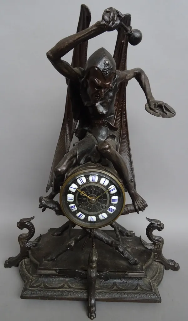 A French spelter and bronze mounted 'Devil band' mantel clock, late 19th century, modelled with the devil astride the drum case, supported on a natura