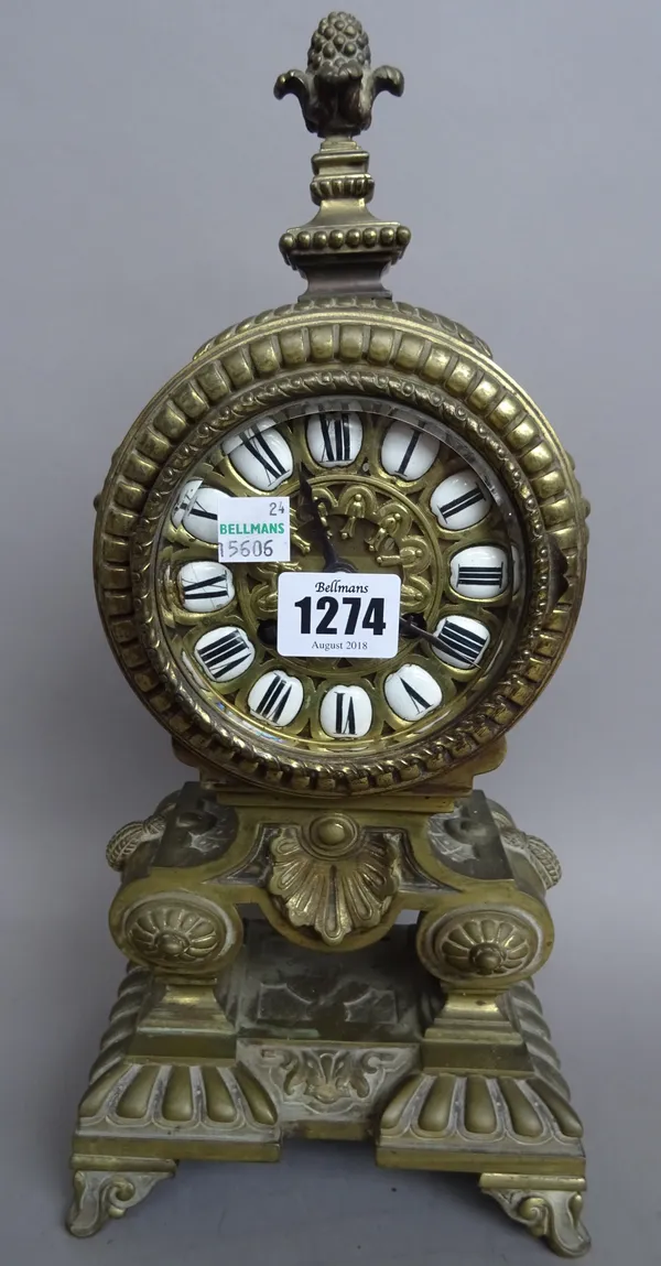 A Louis XIV style brass mantel clock, circa 1900, the two train movement stamped 'MILLER & SONS' (36cm high) and a Japanned mantel clock, gilt cream d