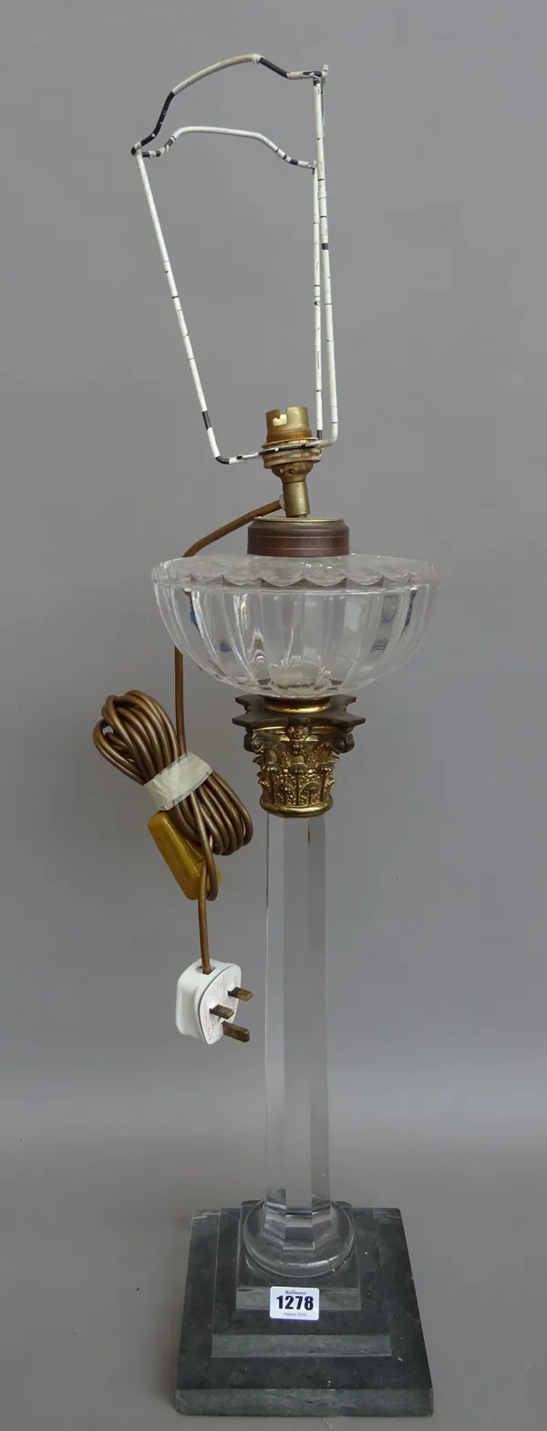 A Victorian glass and gilt metal mounted oil lamp base, (converted to a table lamp) of Corinthian column form, on a stepped square base, 53cm high, ex