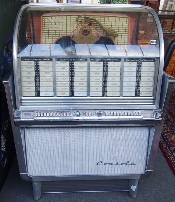 A Wurlitzer console jukebox, multi-selector phonograph circa 1958, model 2204, (a.f) 135cm high x 92cm wide x 69cm deep. Illustrated