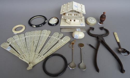 A group of small collectables including; Victorian ivory sewing accessories, teething ring, bangles, carved treen thimble case, 19th century Japanese