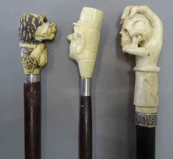 A marine ivory mounted hardwood walking cane, early 20th century, the pommel carved as the head of Charles de Gaulle (91cm), an ivory mounted hardwood