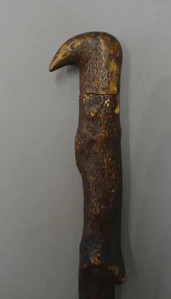 A Shillelagh type gadget walking stick of naturalistic form, the screw top opening to reveal a spirit flask (95cm) and one further marine ivory and ho