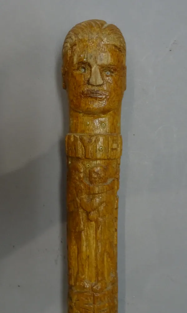 Boxing interest; 'Tommy Farr', Heavy-weight Champion 1937, a carved walking cane, detailed with numerous opponents names, the pommel carved as Tommy F